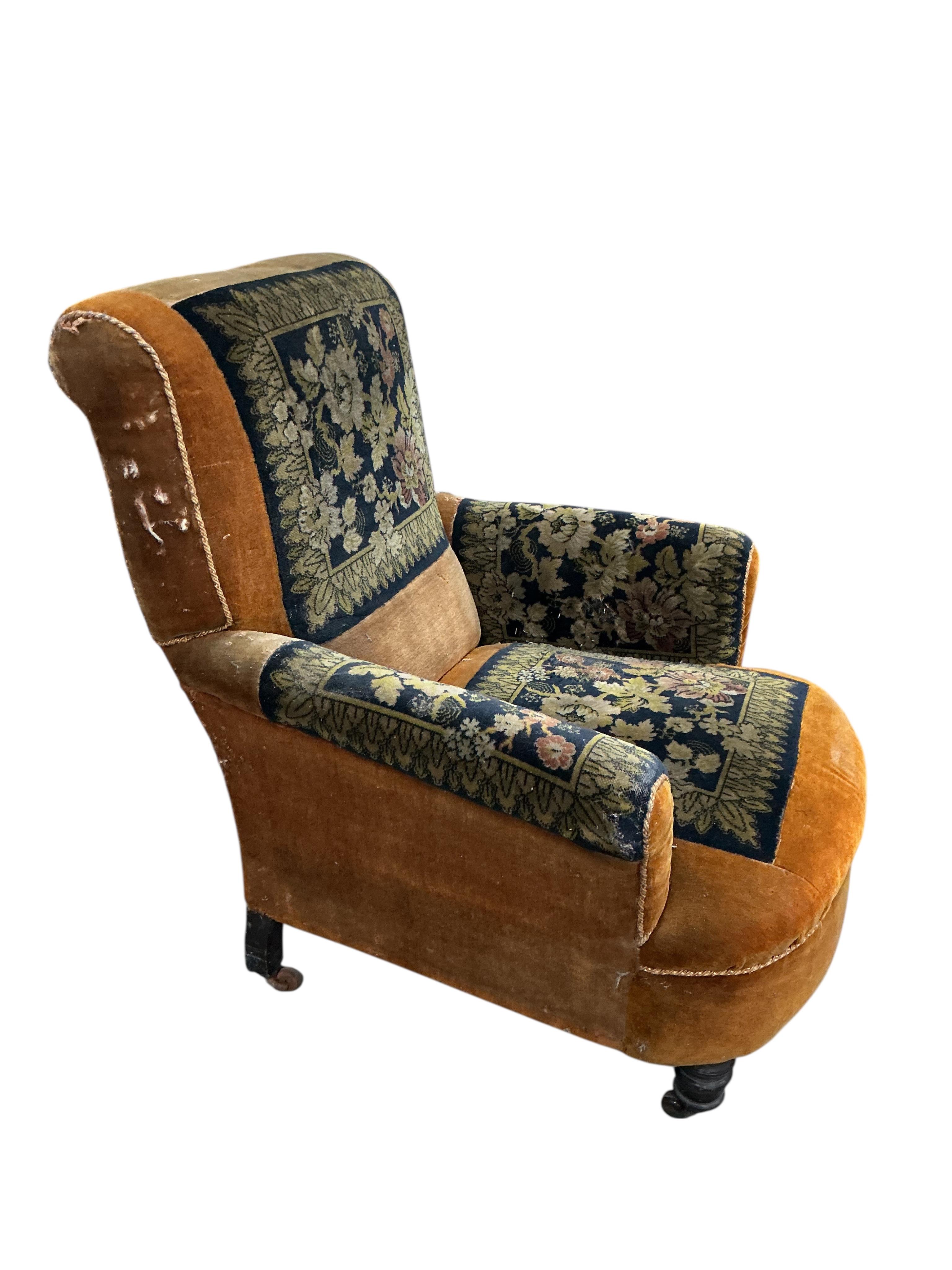 A late Victorian upholstered armchair, width 75cm, depth 74cm, height 88cm
